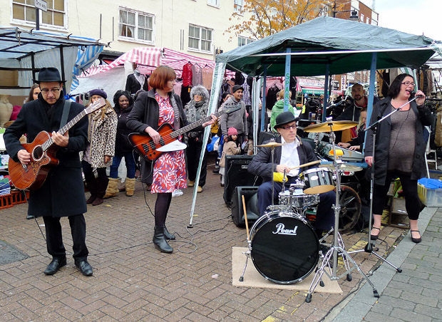 Mrs Mills Experience play the Roman Road Street Market in London's East End as part of Channel 4's Mary Portas TV series, Saturday 10th November 2012