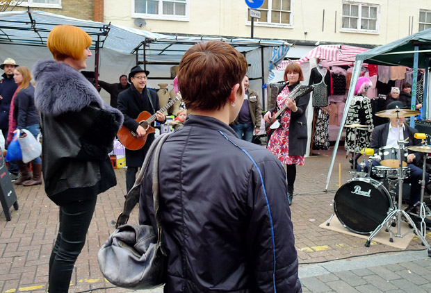 Mrs Mills Experience play the Roman Road Street Market in London's East End as part of Channel 4's Mary Portas TV series, Saturday 10th November 2012