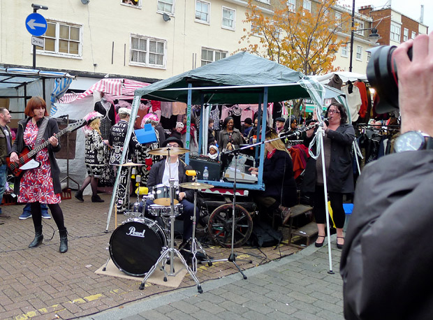 Mrs Mills Experience play the Roman Road Street Market in London's East End as part of Channel 4's Mary Portas TV series, Saturday 10th November 2012