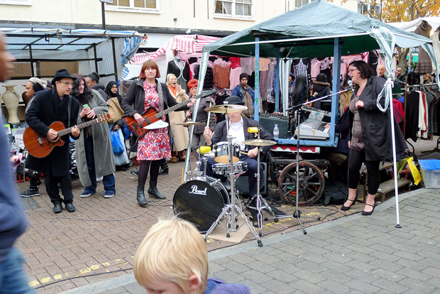 Mrs Mills Experience play the Roman Road Street Market in London's East End as part of Channel 4's Mary Portas TV series, Saturday 10th November 2012