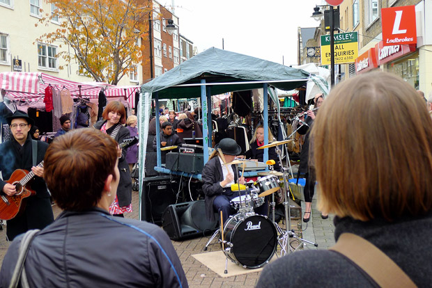 Mrs Mills Experience play the Roman Road Street Market in London's East End as part of Channel 4's Mary Portas TV series, Saturday 10th November 2012