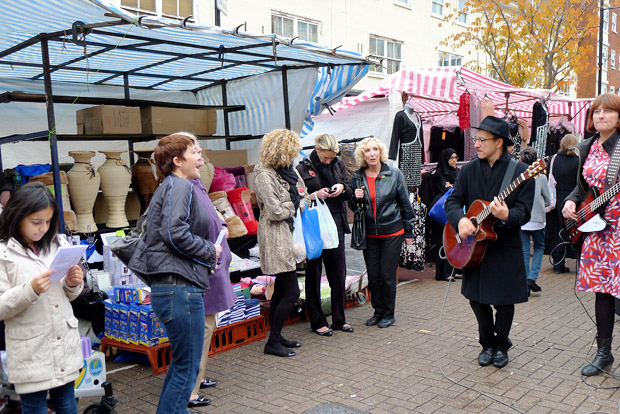 Mrs Mills Experience play the Roman Road Street Market in London's East End as part of Channel 4's Mary Portas TV series, Saturday 10th November 2012